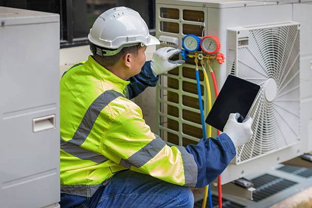 Professional Air Duct Cleaning technician working in Humboldt, TN